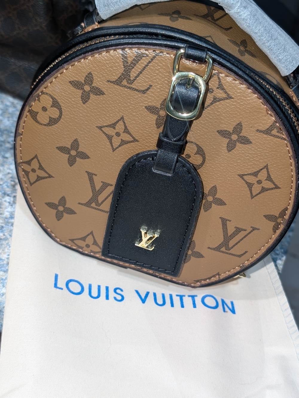 Fashion Inspired Tan & Black Monogram Mini Round Crossbody